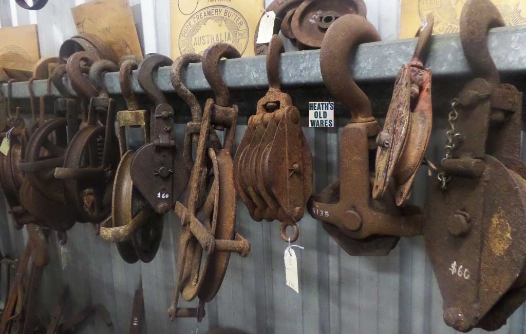 Industrial antique wheels and pulleys for sale at Heaths Old Wares, Collectables, Antiques & Industrial Antiques, 19-21 Broadway, Burringbar NSW 2483 Ph 0266771181 open 7 days