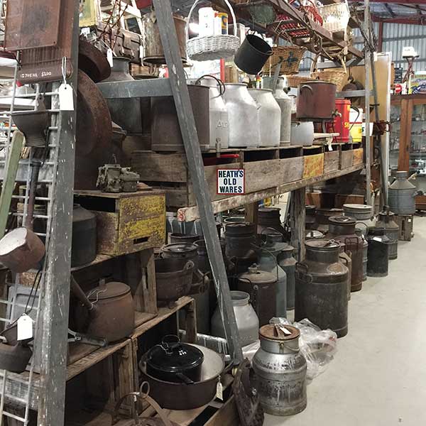 Industrial Antiques, farm tools, books, fishing floats, buckets, wire crates, cream cans, coppers, walking sticks, trunks, oars, anchors, grape buckets, oil pourers, collectables, scale weights, tools, art glass, vintage maps and more for sale at Heath's Old Wares, 19-21 Broadway, Burringbar, NSW 2483 Phone 02 6677 1181 open 7 days 9am - 5 pm