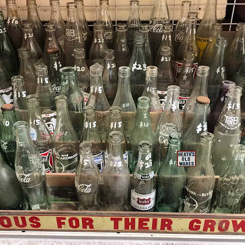 Assorted vintage and antique ceramic label cordial bottles for sale at Heaths Old Wares, Collectables, Antiques & Industrial Antiques, 19-21 Broadway, Burringbar NSW 2483 Ph 0266771181 open 7 days