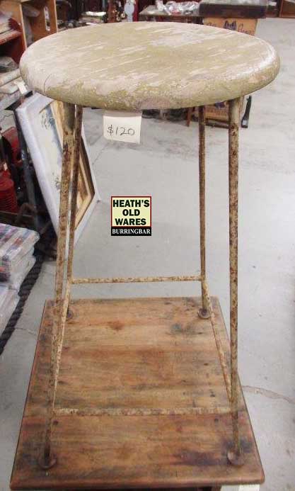 Timber topped mottley beige coloured stool with metal frame  for sale at Heaths Old Wares, Collectables, Antiques & Industrial Antiques, 19-21 Broadway, Burringbar NSW 2483 Ph 0266771181 open 7 days 